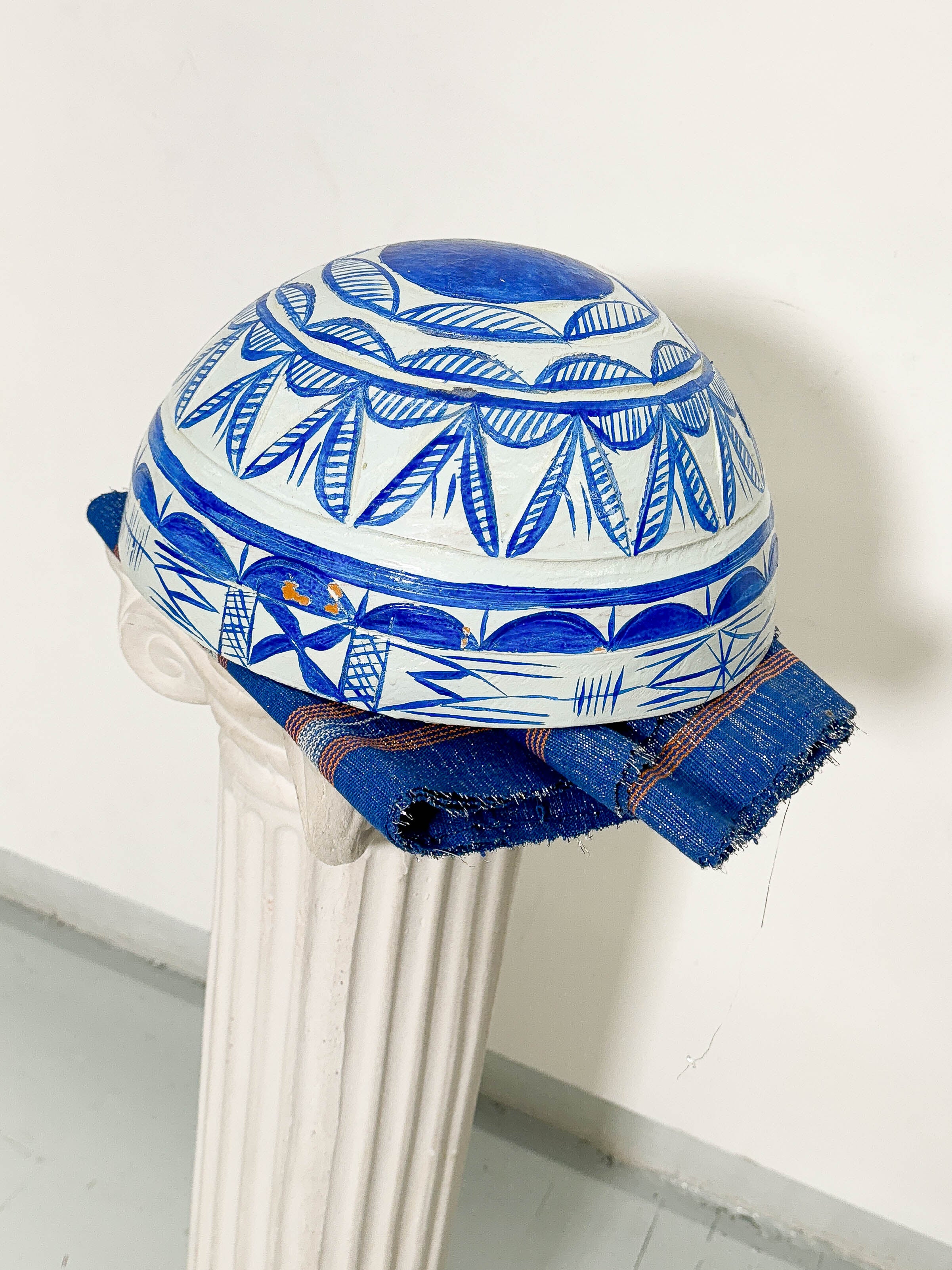 White and blue dried hollowed gourd serving bowl