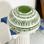 White and green dried hollowed gourd serving bowl