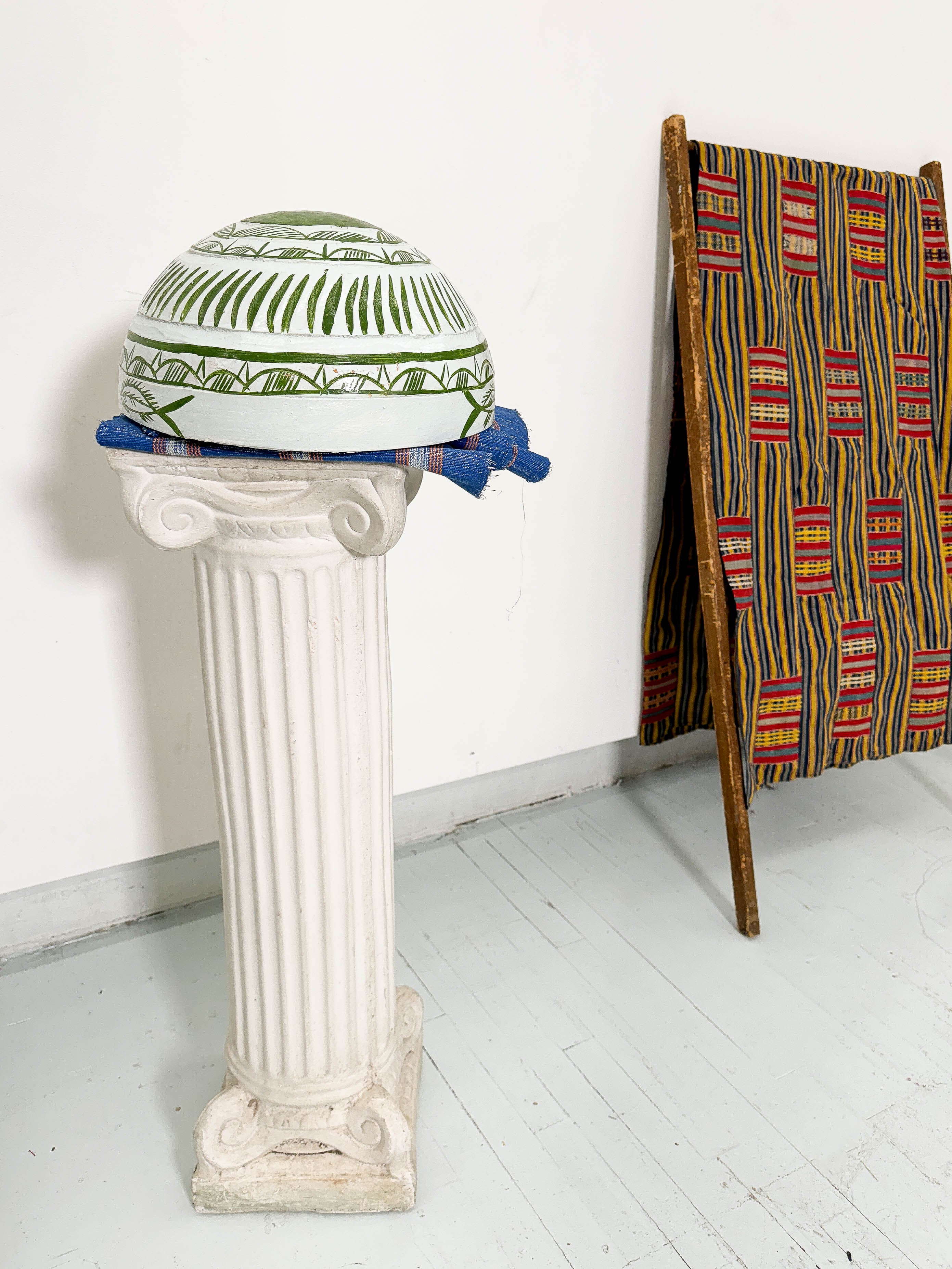 White and green dried hollowed gourd serving bowl