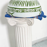 White and green dried hollowed gourd serving bowl