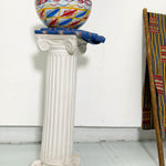 White, blue, red, and yellow dried hollowed gourd serving bowl