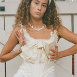 romantic panna cream silk opera corset with bow
