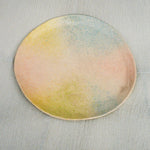 handmade ceramic plate in sunset hues