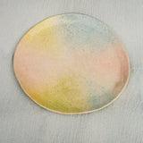 handmade ceramic plate in sunset hues