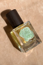 Load image into Gallery viewer, yellow perfume clear glass bottle wax stamped