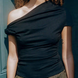 black cupro fitted off shoulder twist top