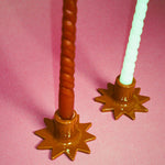 handmade star shaped glazed ceramic candleholders in brown