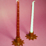 handmade star shaped glazed ceramic candleholders in brown