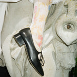 feminine black leather ballet mary jane shoe