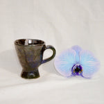 handmade ceramic mug in blue and black glaze