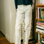 white cotton green ink splatter stove pipe jeans