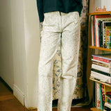 white cotton green ink splatter stove pipe jeans