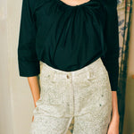 white cotton green ink splatter stove pipe jeans