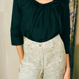 white cotton green ink splatter stove pipe jeans