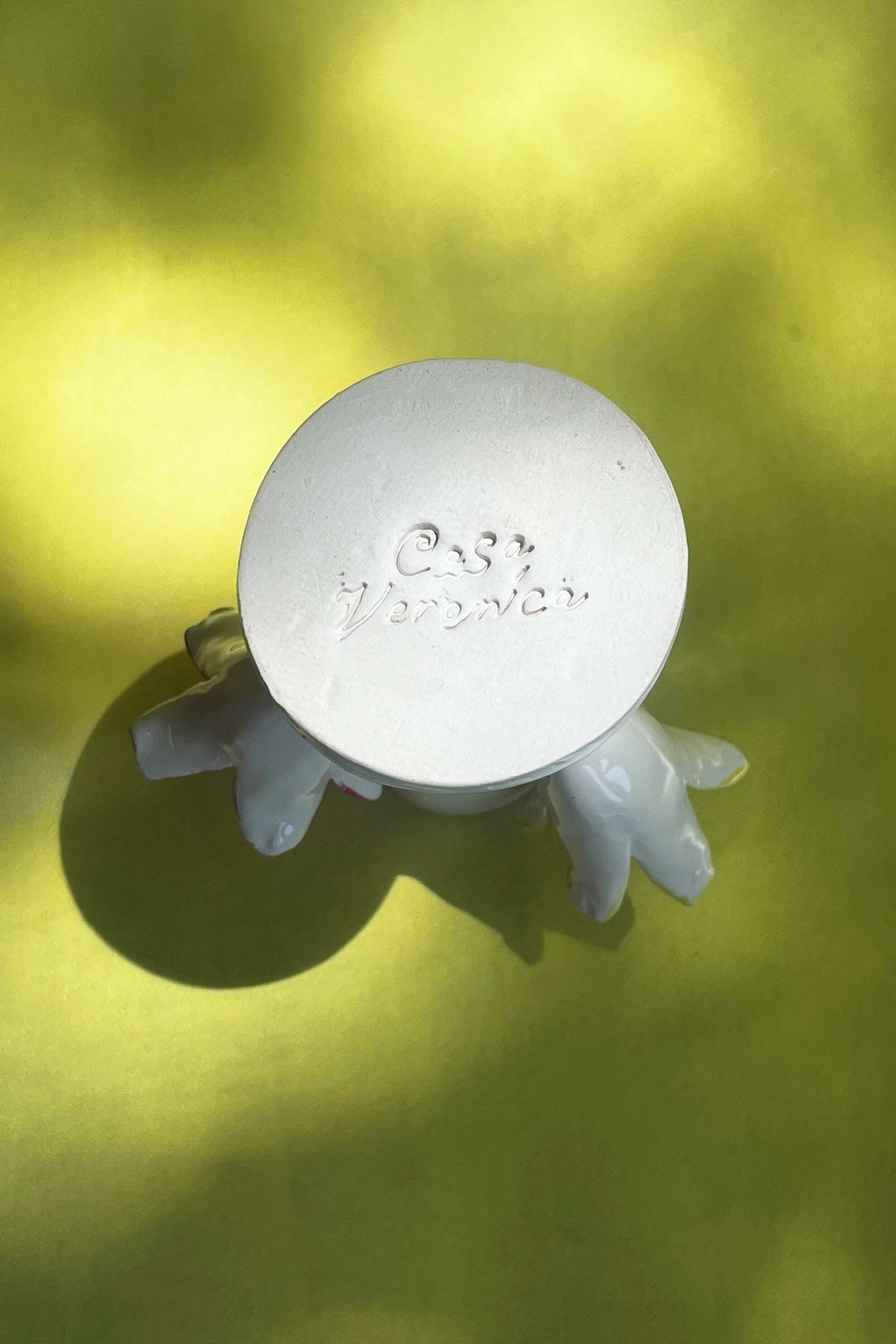 ceramic glazed candleholder in white with multi leaves