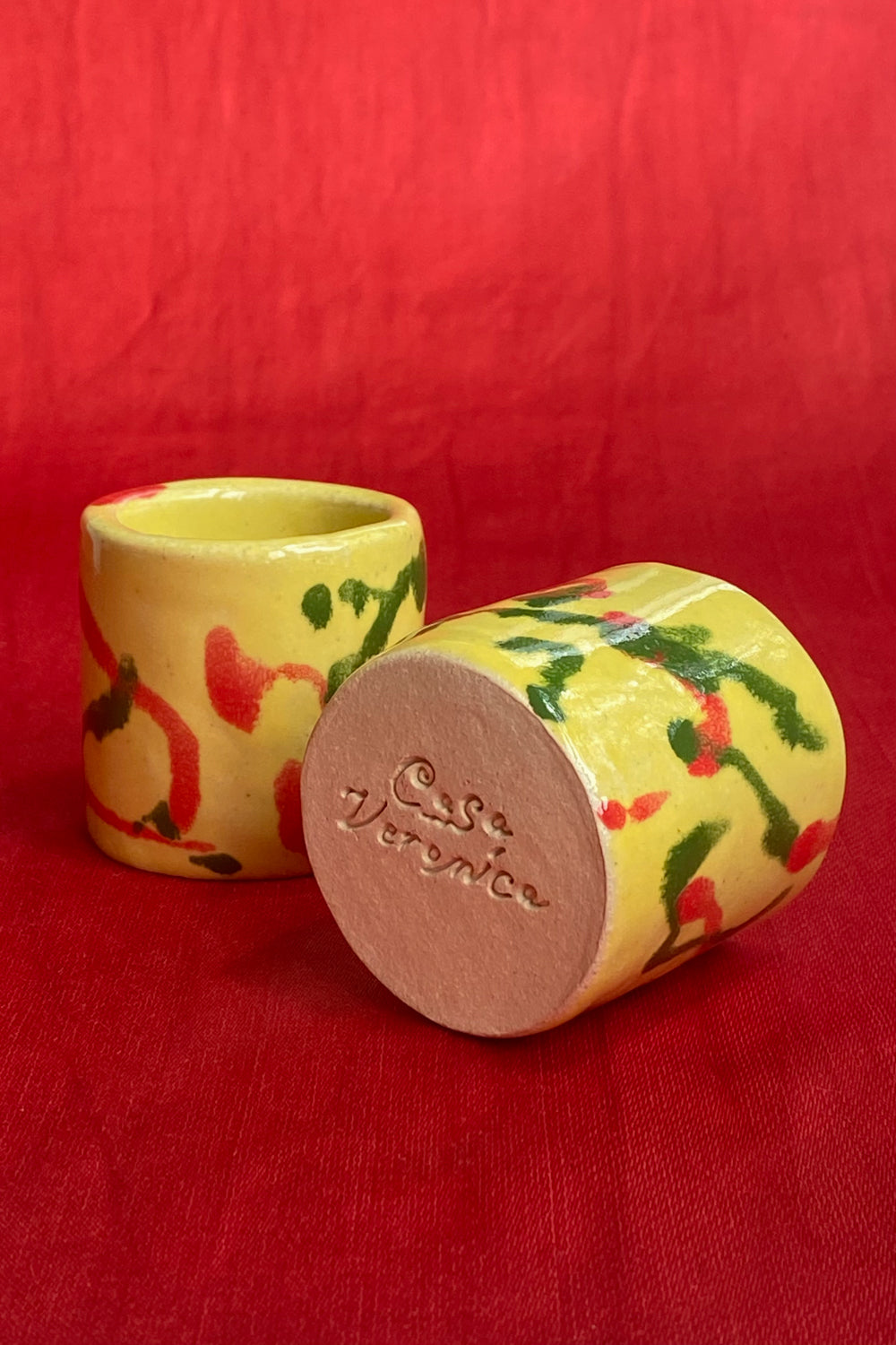 ceramic hand painted sipping tumblers in primaries