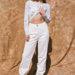 white cotton mid rise stovepipe cowboy jean