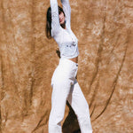 white cotton mid rise stovepipe cowboy jean