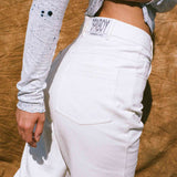 white cotton mid rise stovepipe cowboy jean