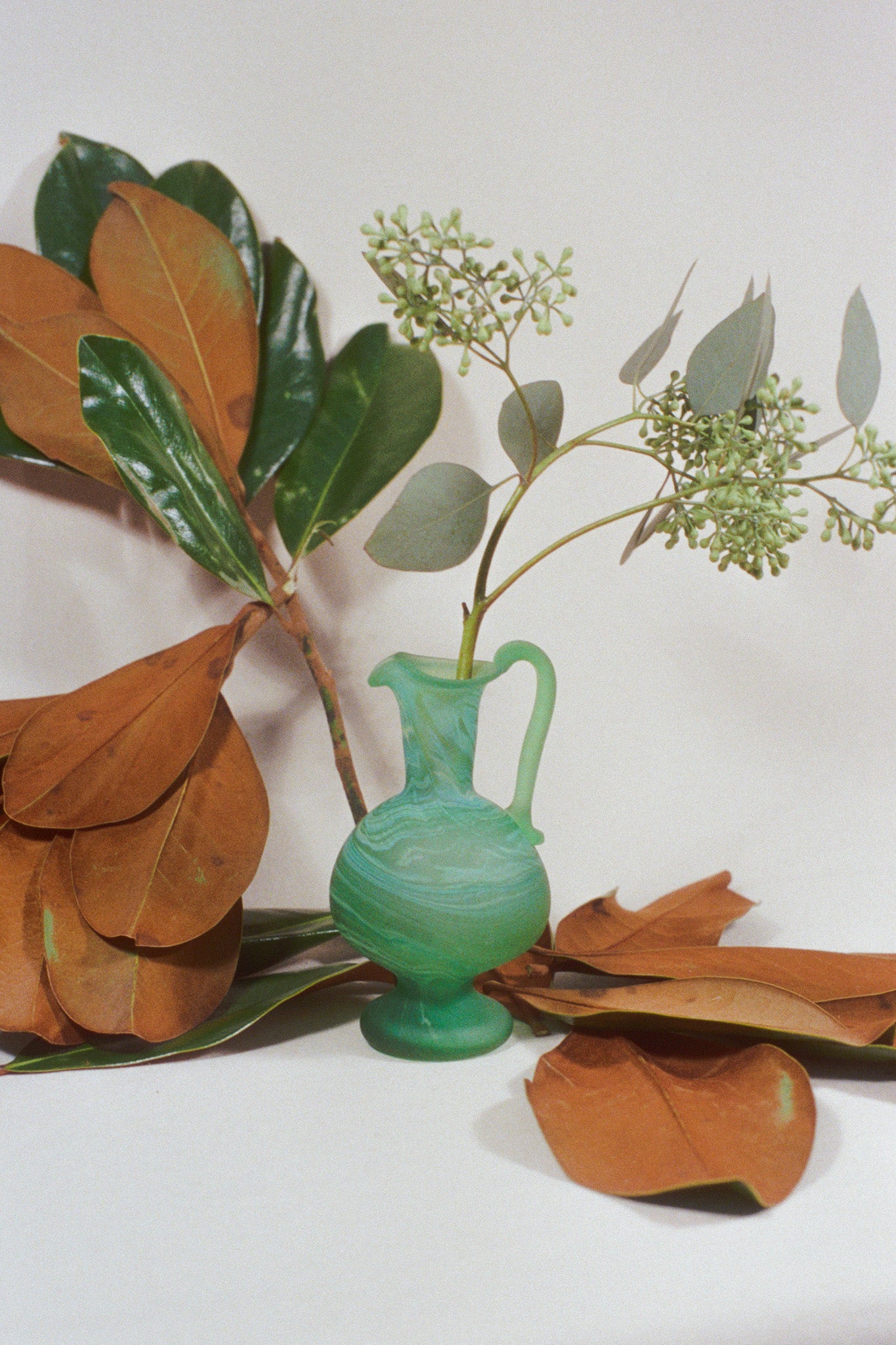 green mineral handblown glass small spouted pitcher vase
