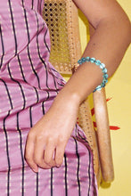 Load image into Gallery viewer, teal glass bead bracelet strung on silk thread