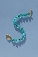 Load image into Gallery viewer, teal glass bead bracelet strung on silk thread