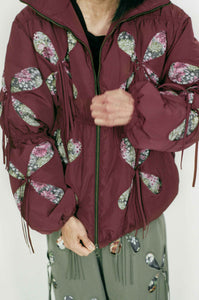 burgundy nylon winter jacket flower filled cutouts