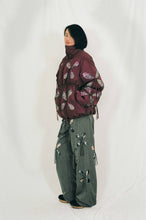 Load image into Gallery viewer, burgundy nylon winter jacket flower filled cutouts