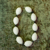 HOST NECKLACE, EGG