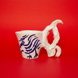 SCULPTURAL CUPS IN PORCELAIN WITH HAND PAINTED BIRDS