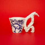 SCULPTURAL CUPS IN PORCELAIN WITH HAND PAINTED BIRDS