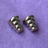 PUPA EARRINGS IN WHITE BRONZE
