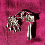 EYE AND DROPS BROOCH