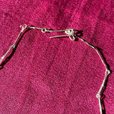 TASSELED EGG NECKLACE