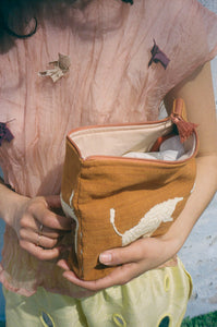 ORANGE LAMBS TOILETRY BAG