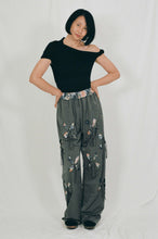 Load image into Gallery viewer, grey nylon polyester track pants petal cutout fabric underneath