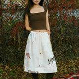 PONY DRAW STRING SKIRT