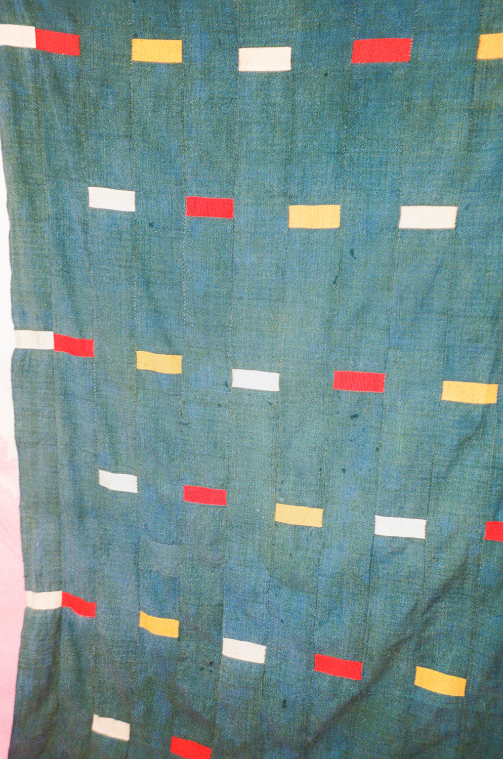 PRIMARY BLOCKS ON BLUE BAOULÉ CLOTH