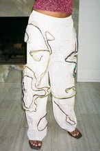 Load image into Gallery viewer, white straight leg nylon pants with floral appliqués