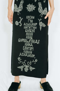 black merino wool vest dress narrative Uzbek designs