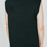black merino wool vest dress narrative Uzbek designs