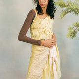 SHELL DRESS WITH PINK TIE
