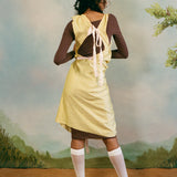 SHELL DRESS WITH PINK TIE