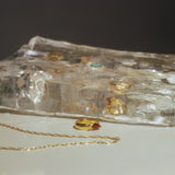 ENERO RING IN GOLD/GARNET