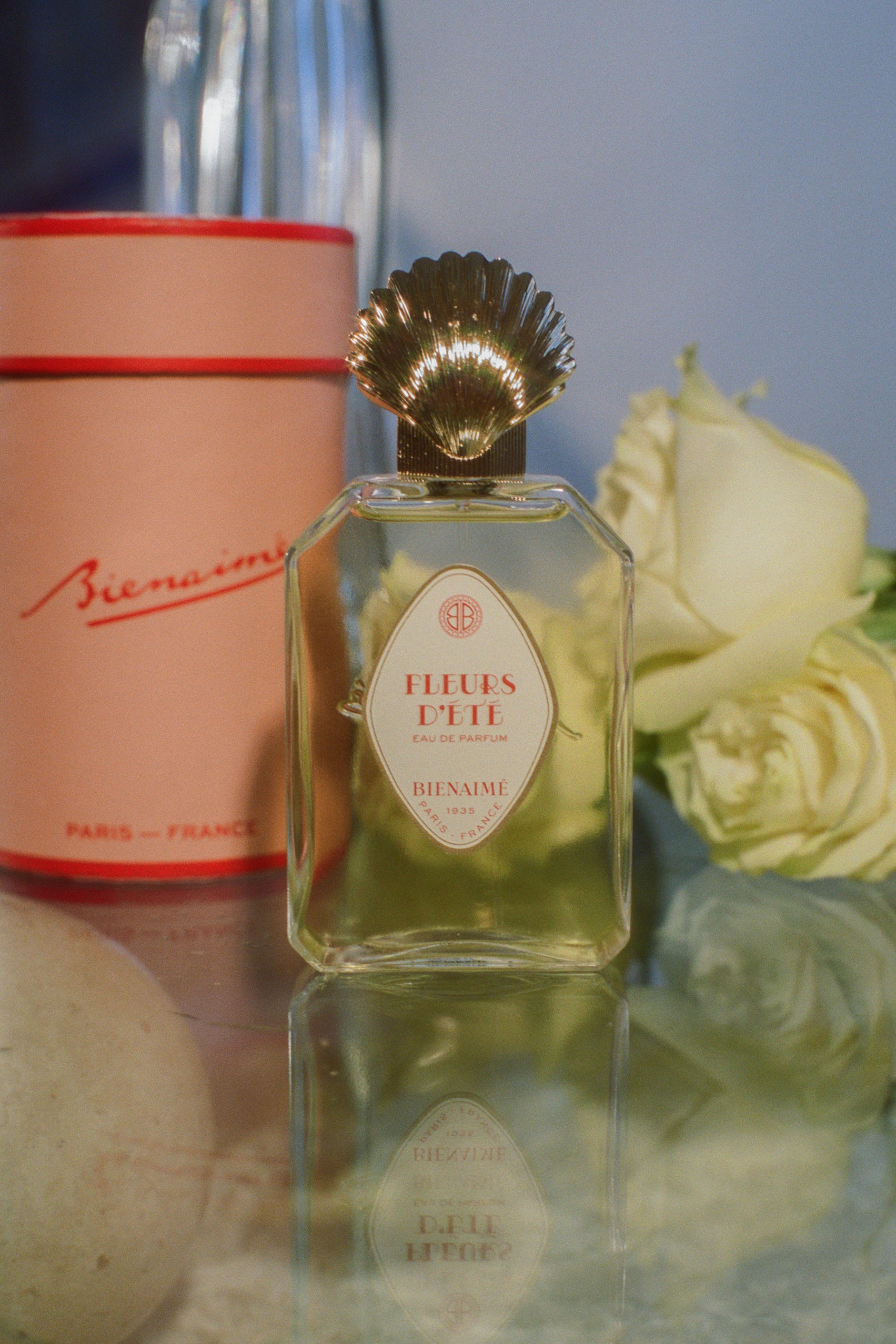 Parisian perfume glass bottle gold seashell topper