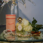 Parisian perfume glass bottle gold seashell topper