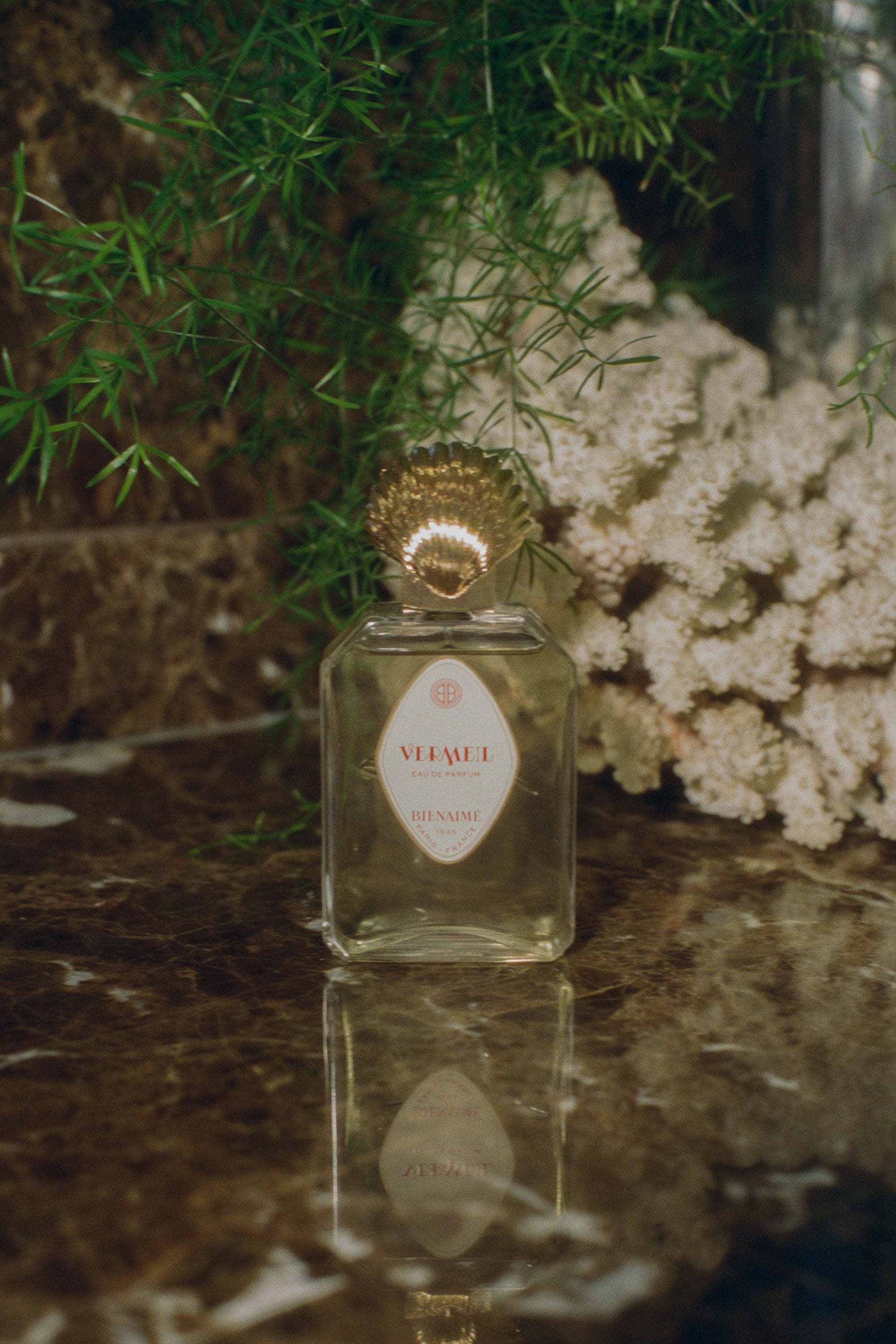 Parisian perfume glass bottle gold seashell topper