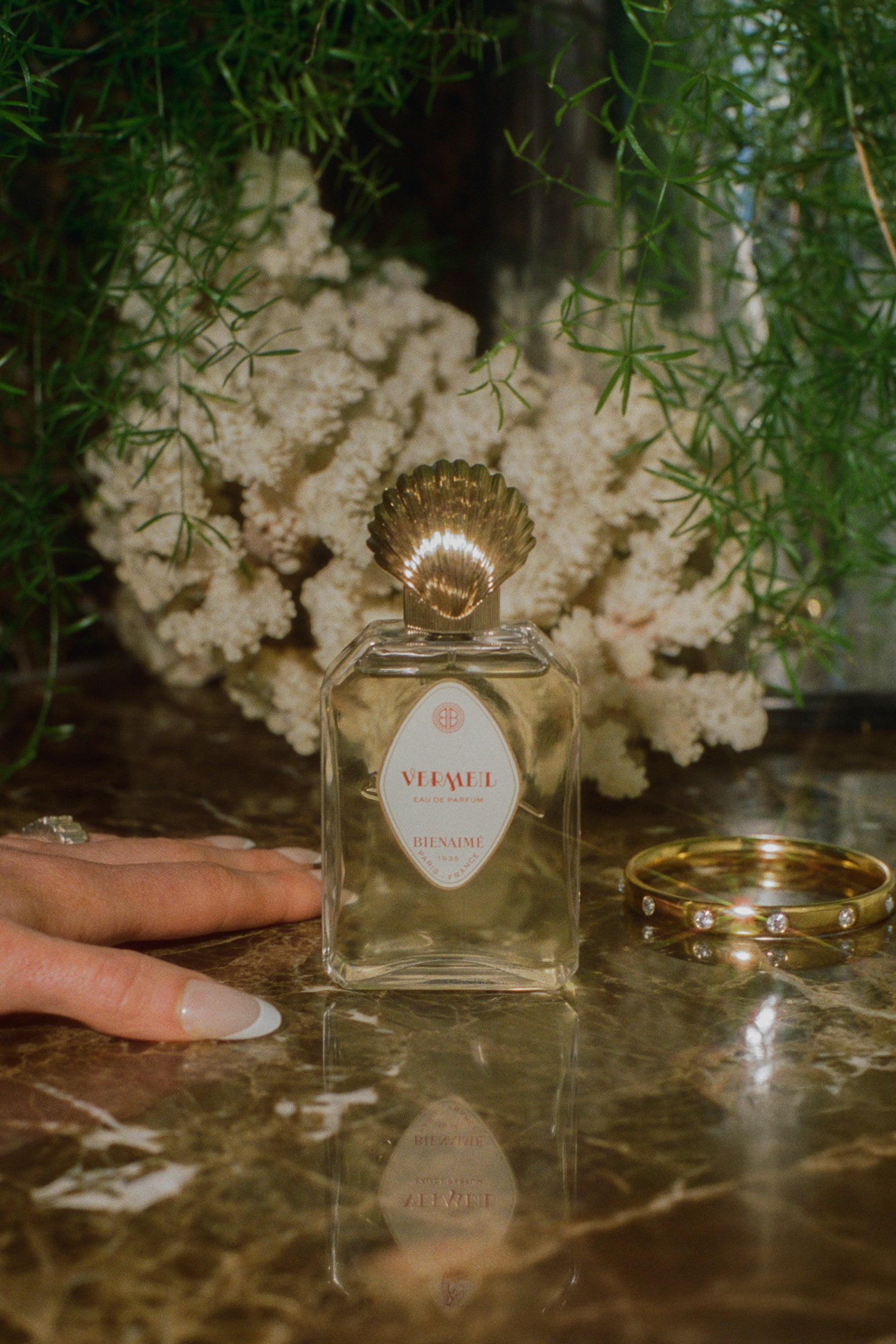 Parisian perfume glass bottle gold seashell topper