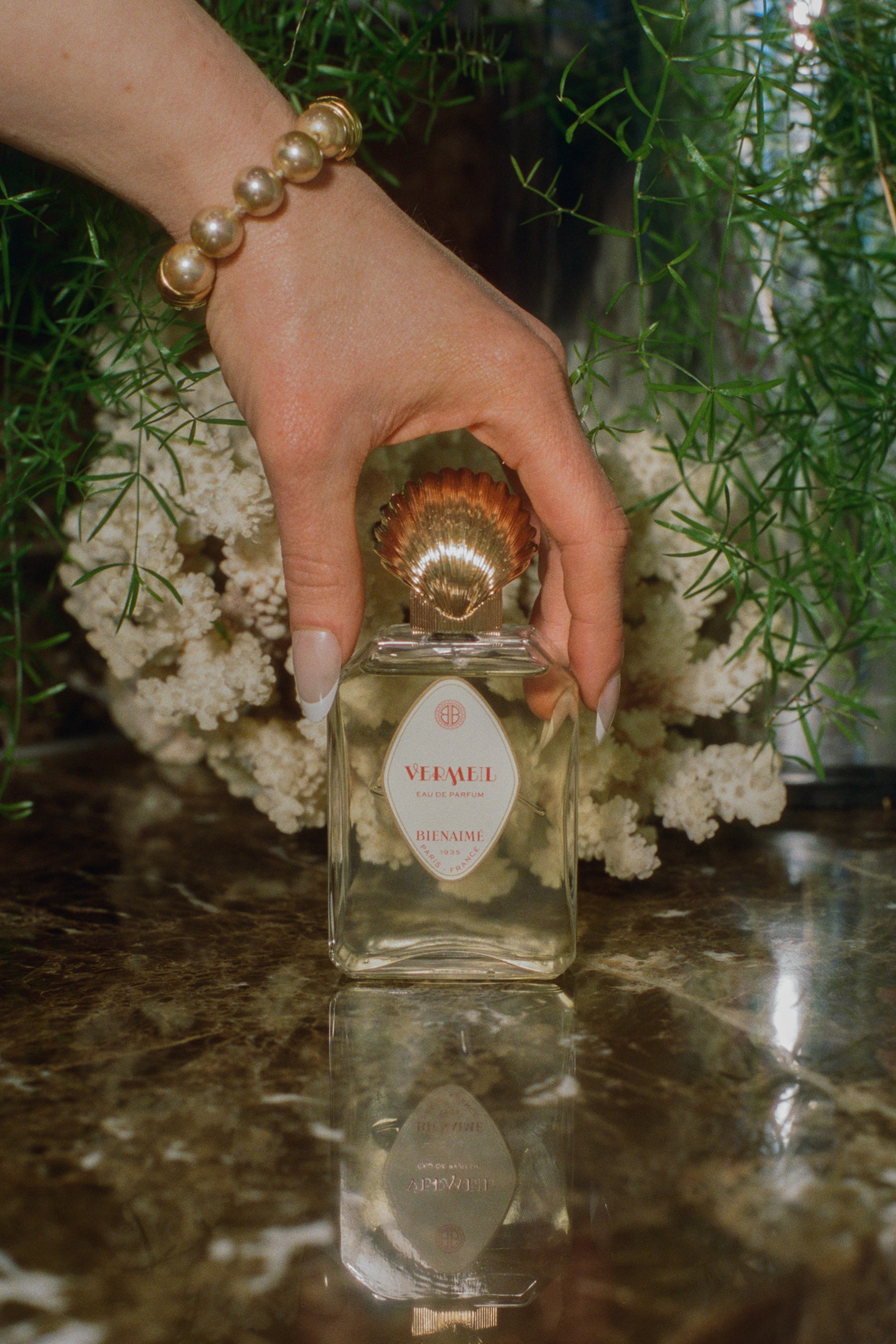 Parisian perfume glass bottle gold seashell topper