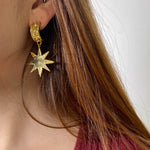 brass demi hoop earrings with dangling star